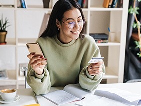 Woman using a credit card