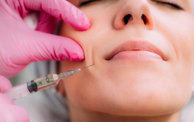 a patient undergoing dermal filler treatment