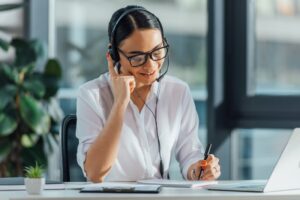 language interpreter working on laptop 